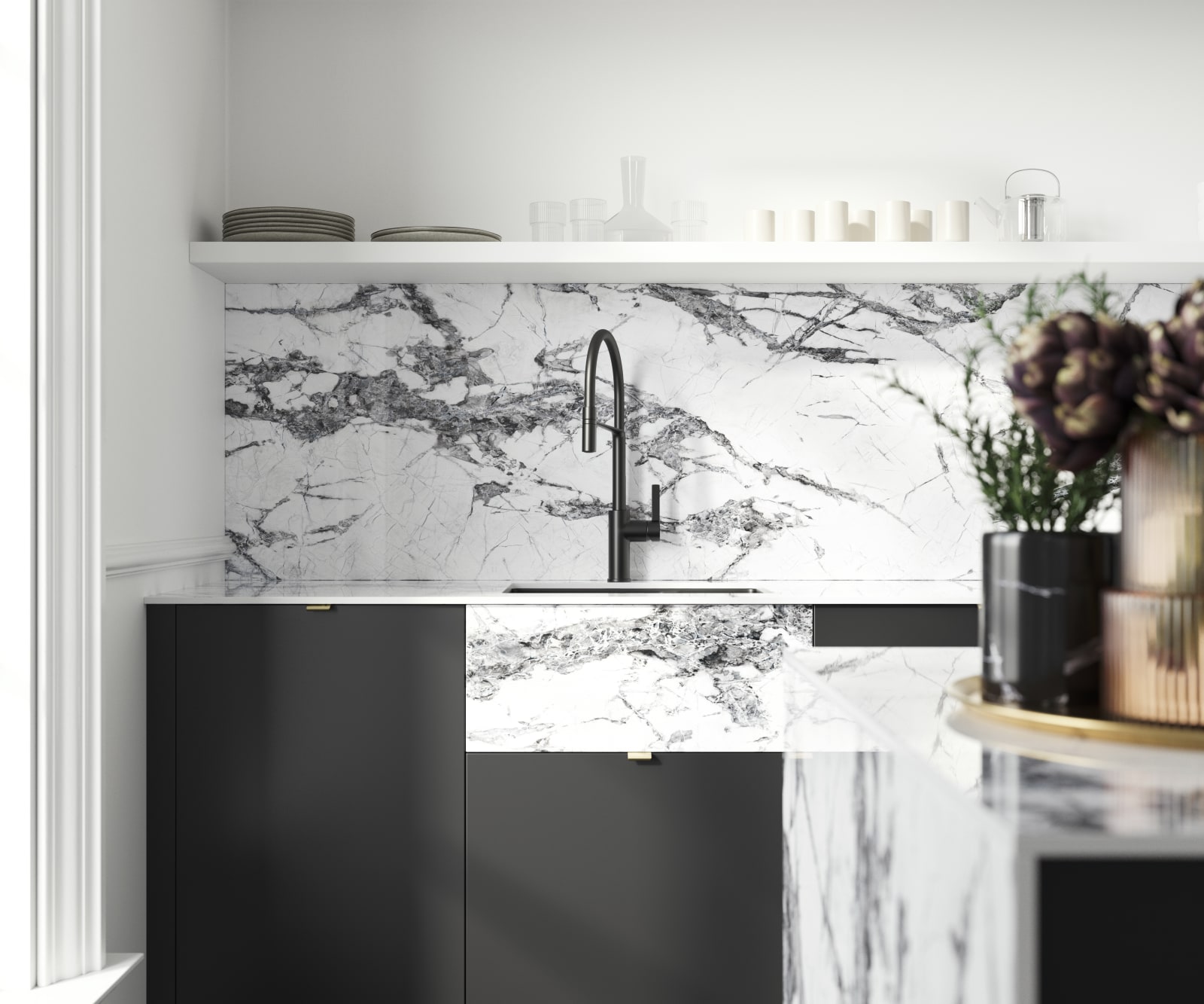 Minimal maximalism with Magnet's Hoxton kitchen in Sumi Black, combined with fake belfast sink using with white marbled worktop and splashbacks.