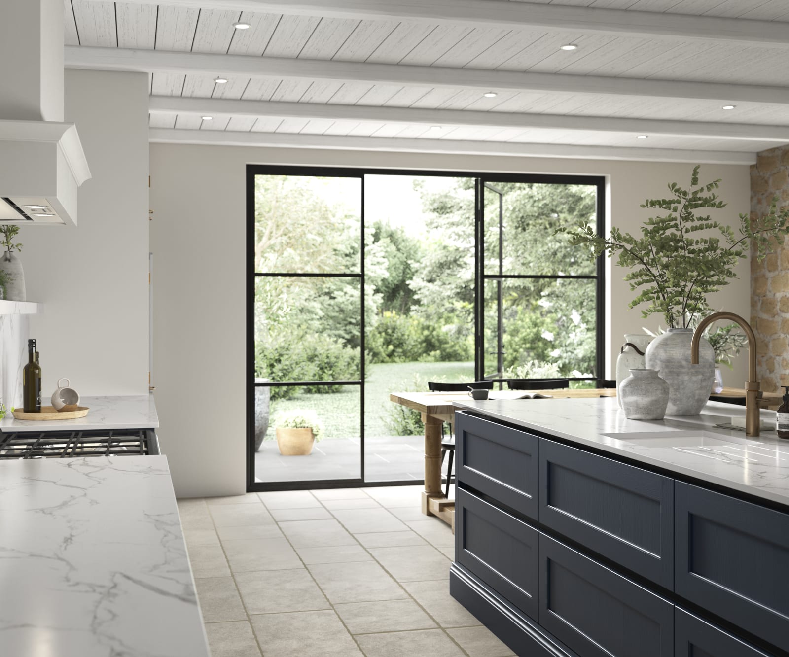 View of Integra Ludlow kitchen island in shade Midnight, with opened glass doors to a garden in the background.