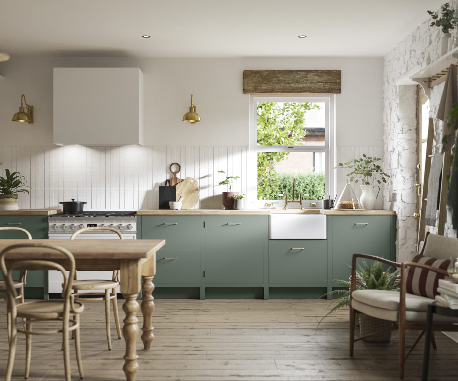 Soho Eucalyptus green open plan kitchen in contemporary cottage with a light wood dining table.