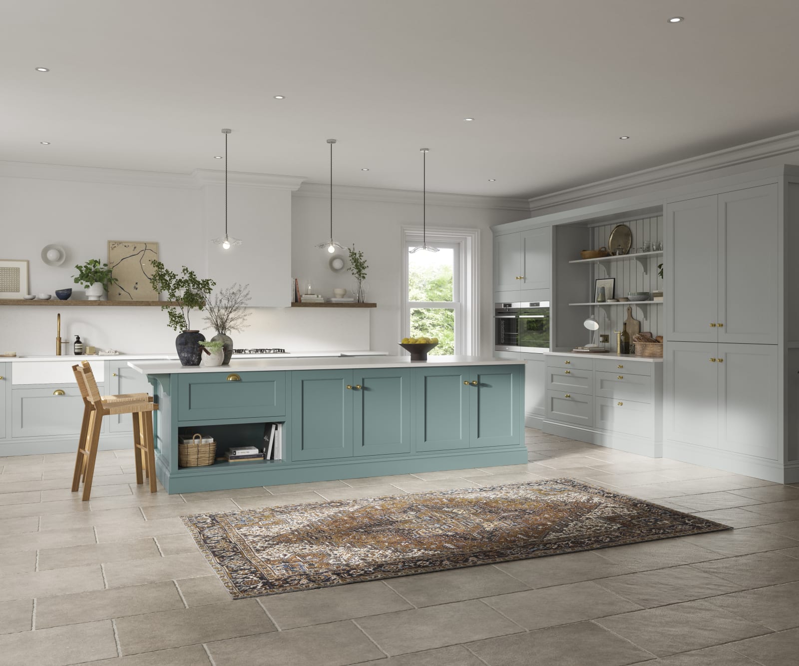 Traditional Shaker-style kitchen range in light grey with a blue kitchen island.