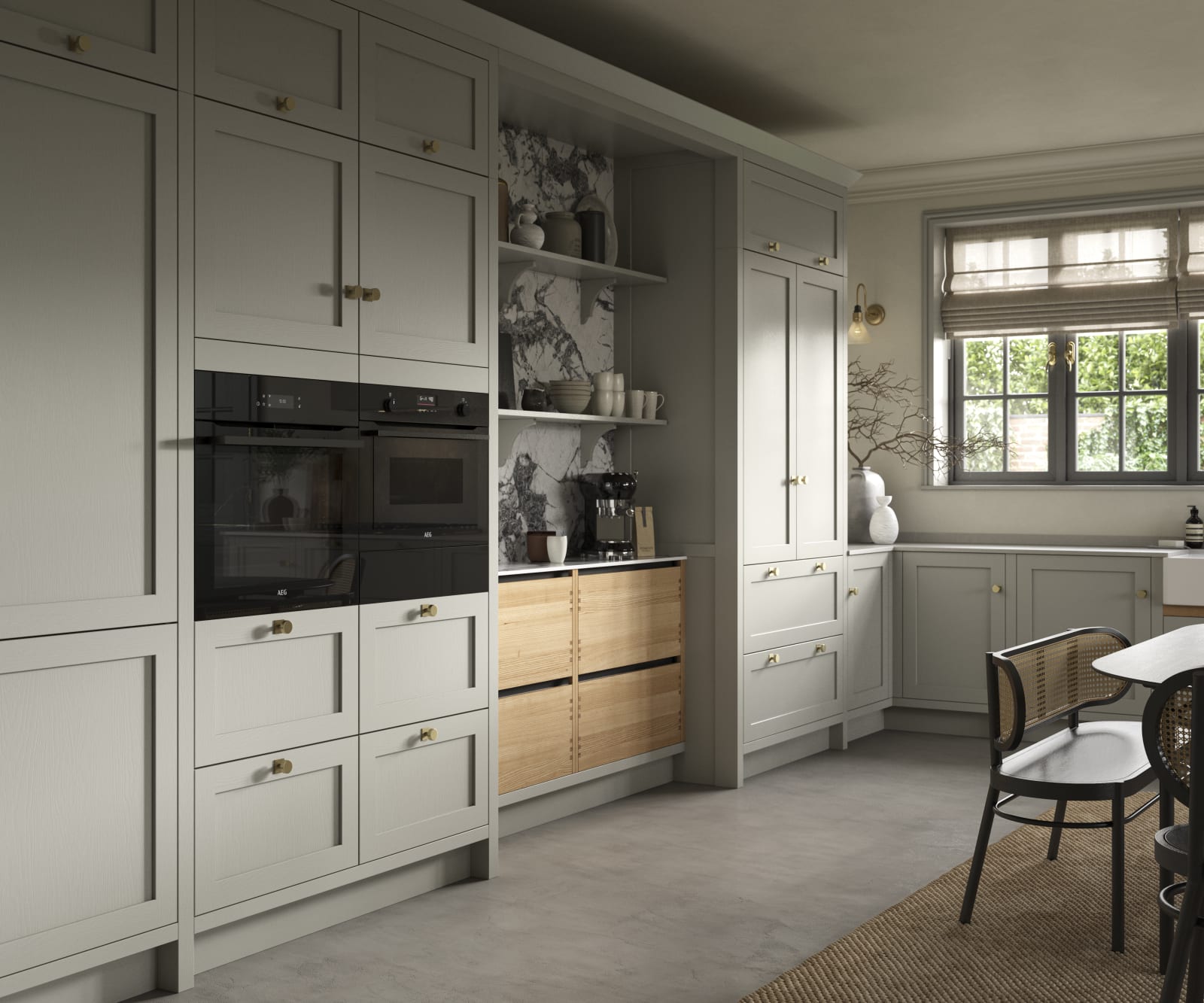 A neutral Shaker kitchen with Pebble and Nordic Craft cabinetry, with belfast sink.