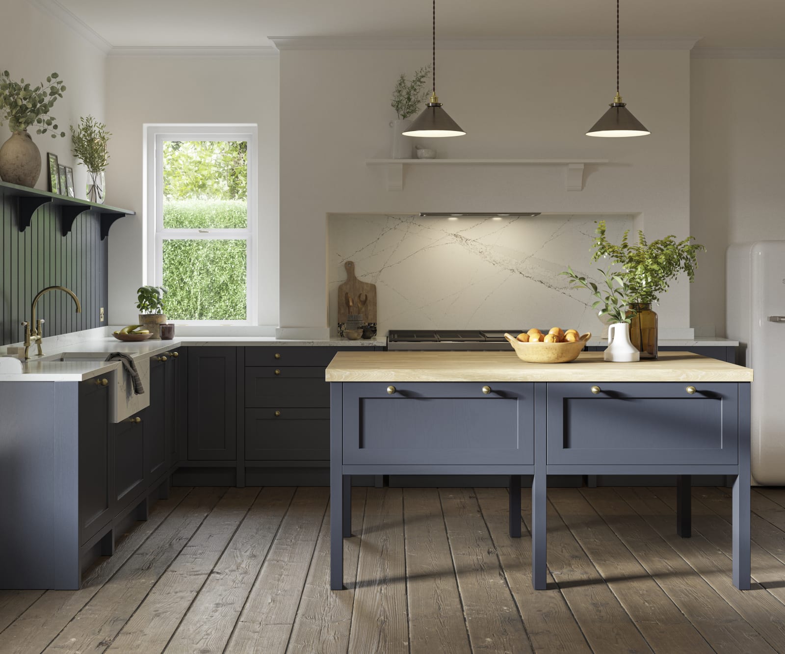 Open floorplan shaker kitchen in the dark blue shade Midnight, paired with a kitchen island and white Smeg fridge.