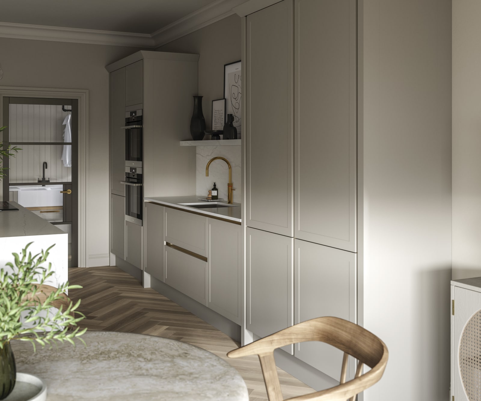 Integra Dunham Pebble path tall cabinets in neutral kitchen decorated with plants and brass tap