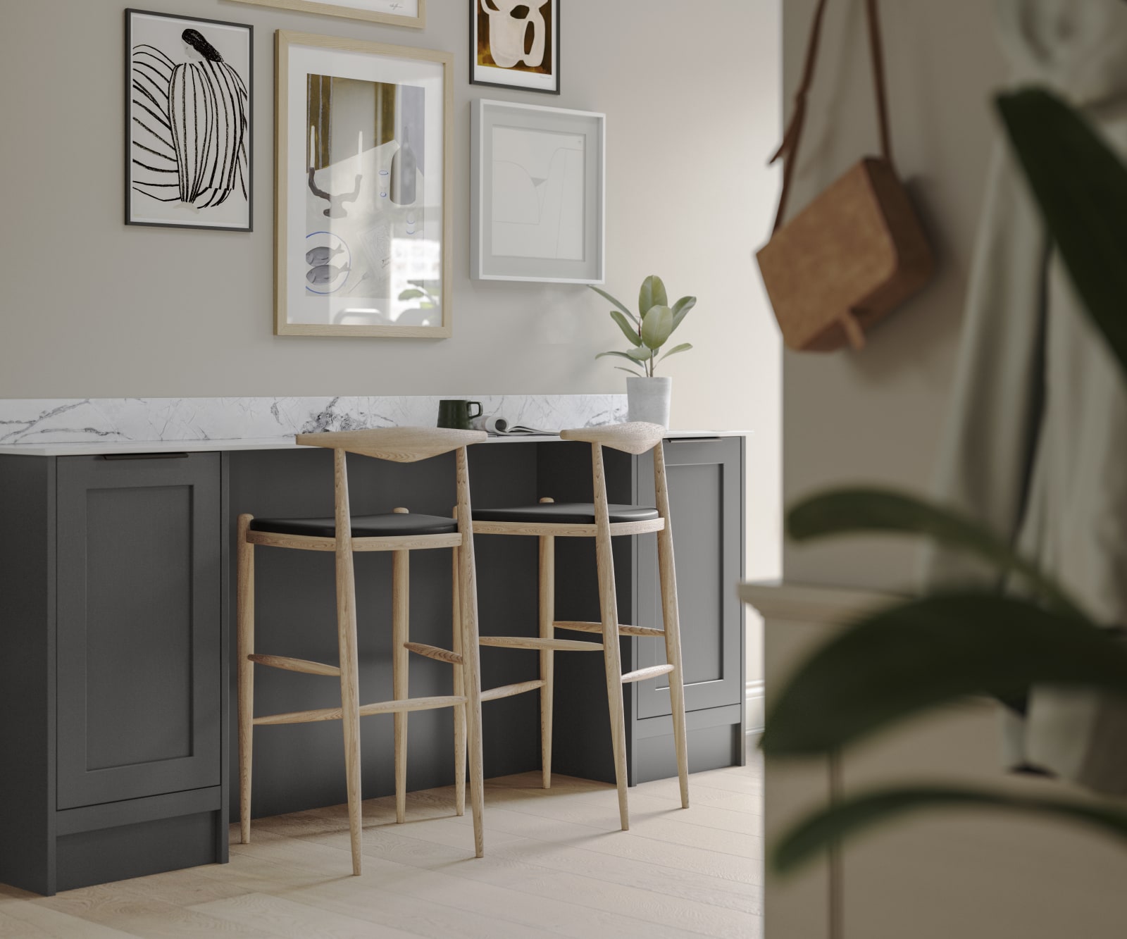 A dark grey Shaker bar sideboard with Charcoals cabinetry, paired with marble splashback and wooden high chairs.