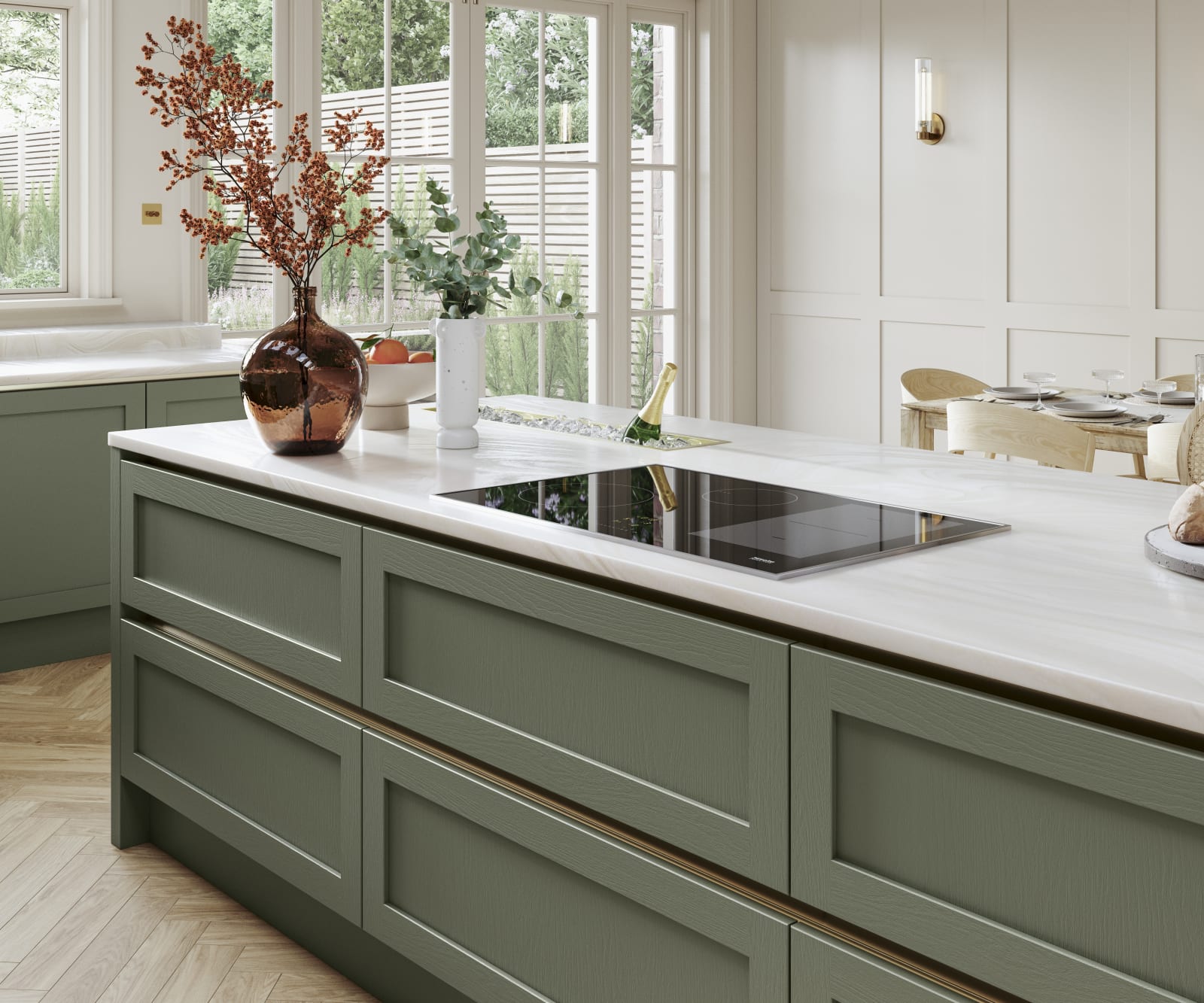 Kitchen island in Integra Wardley shade Misty Moor with narrow framing and integrated handles, on a painted timber finish.