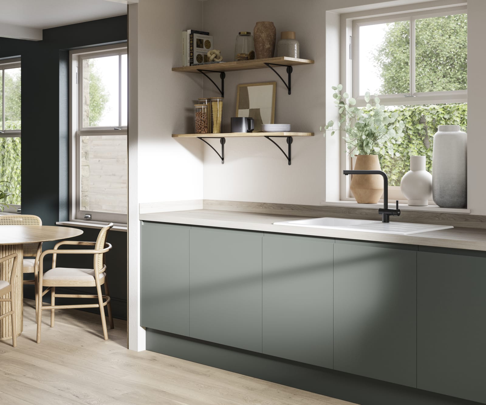 Minimalist kitchen design Luna in a green shade. Its integrated handle gives any kitchen a beautiful, sleek finish.