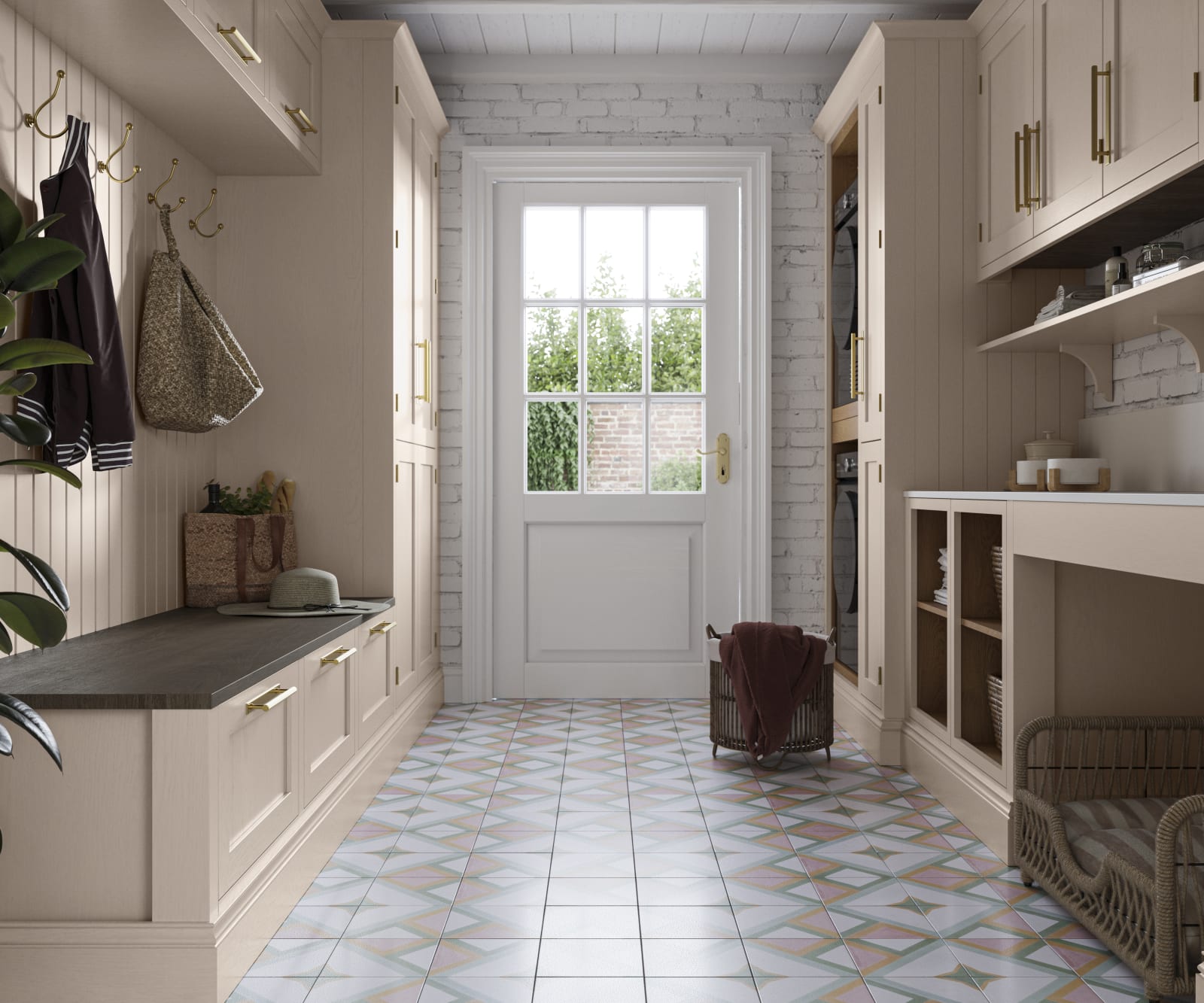 Combined Utility room and entrance hallway, with Wardley shell cabinetry on each side, paired with brass handles and organic materials in laundry baskets, dog bed and a large potted plant.