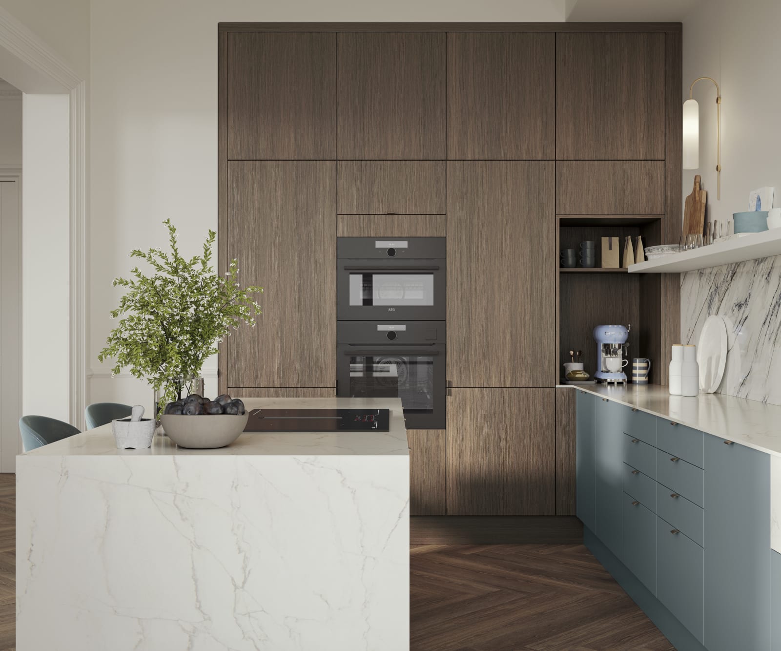 Soho Duck Blue kitchen from Magnet combined with ovens integrated into tall Nordic Nature cabinetry, white marble splashblack, paired beautifully with a bright brass tap and sink.