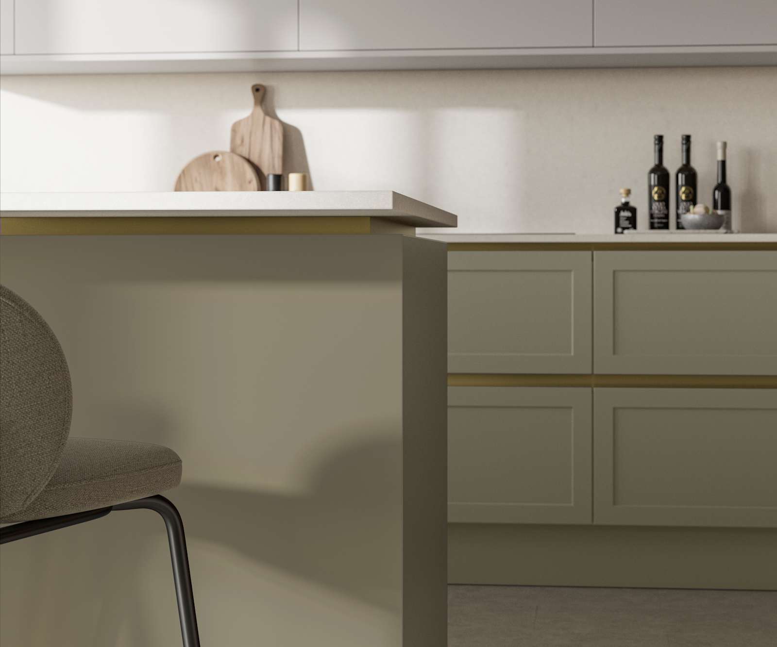 Integra Dunham French Clay, a handleless shaker frontal with brass details and a white worktop..