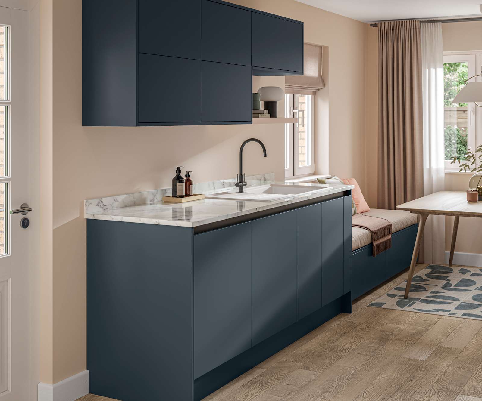 Handleless Integra Ascoli Mineral Blue, a dark blue kitchen with a rounded matt black tap with white sink, a white and grey marbled worktop with matching upstand.