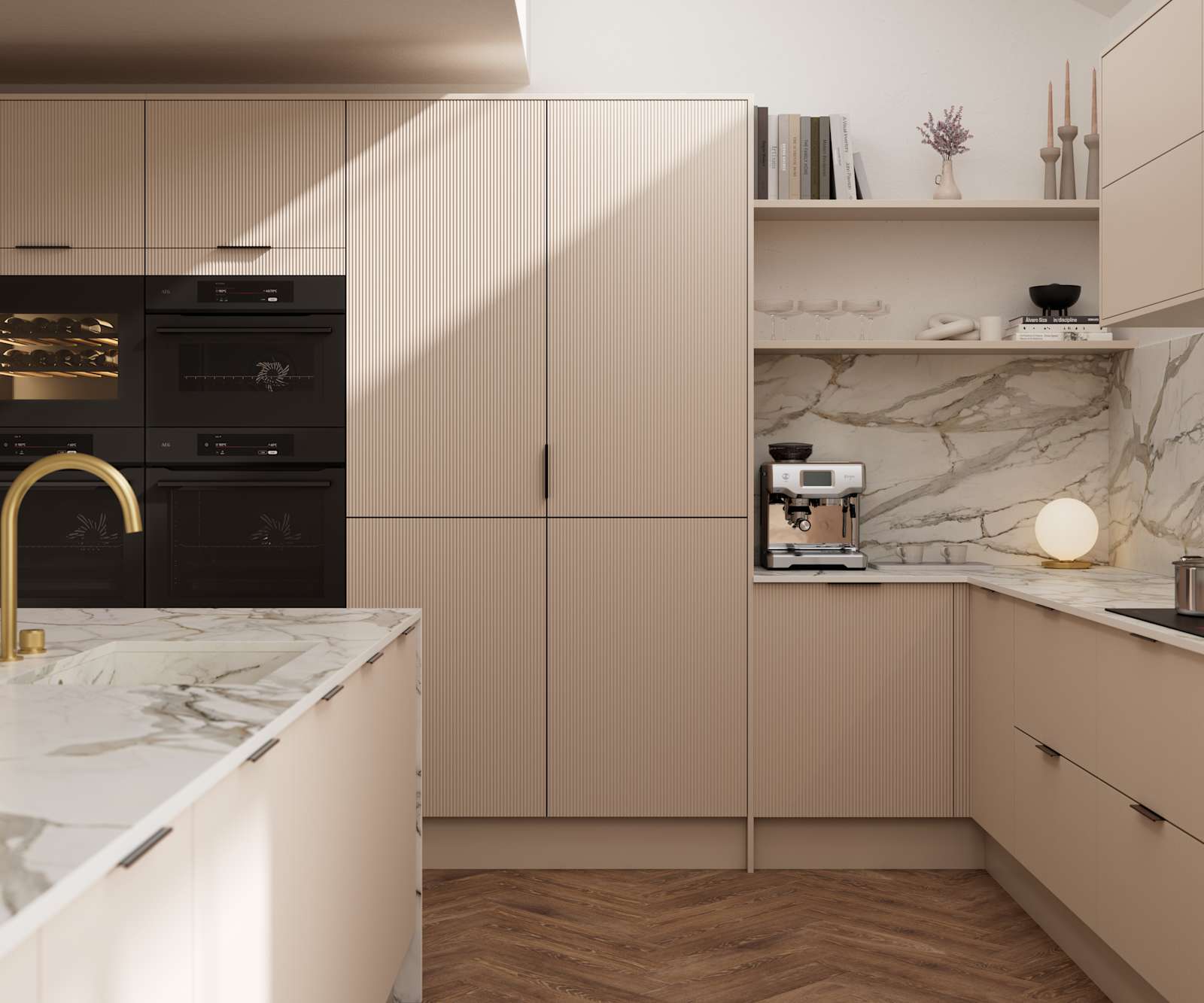 Fluted front kitchen Reed from Magnet in light warm neutral shade Shell, with a marbled splashback and worktop, brass tap in kitchen island sink