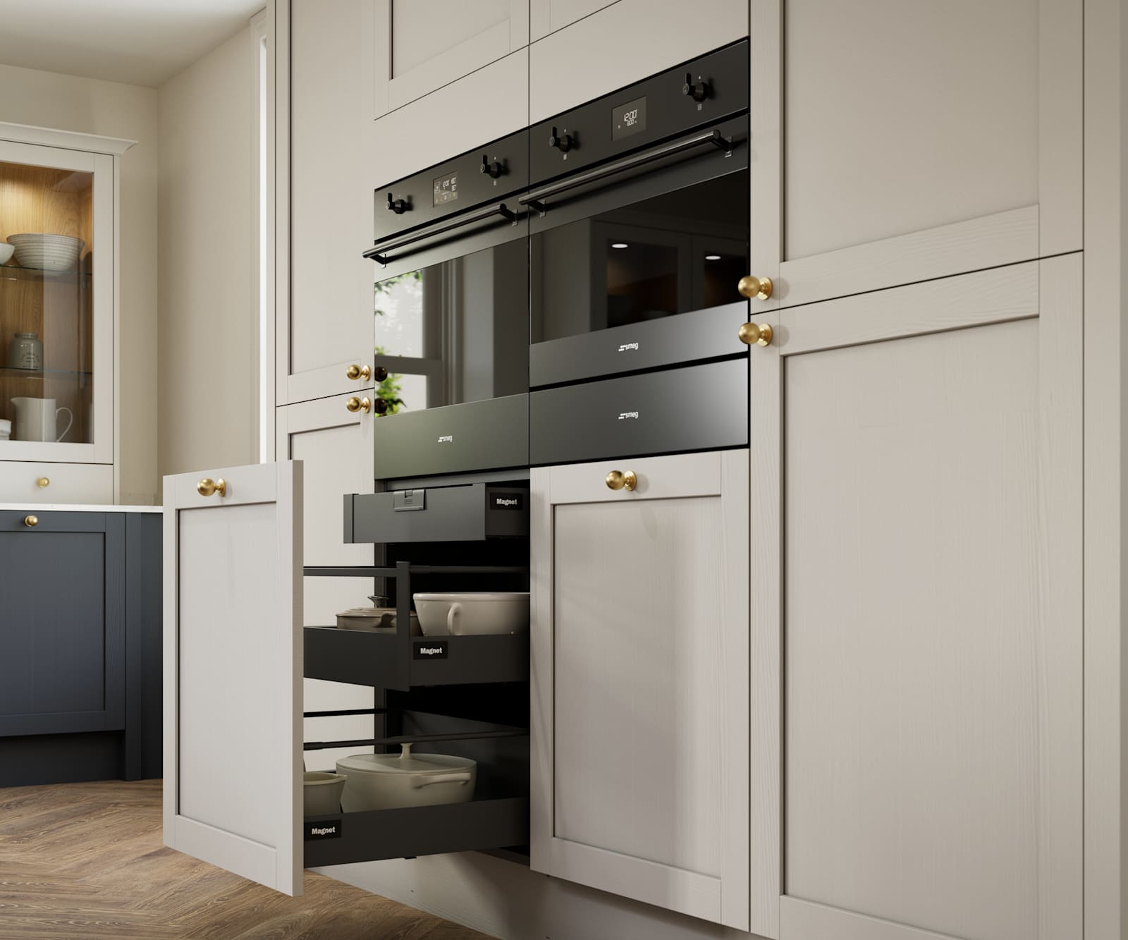 Contemporary Shaker kitchen Ambleside from Magnet in deep blue shade Lake, beige tall cabinets with ovens, brass knobs