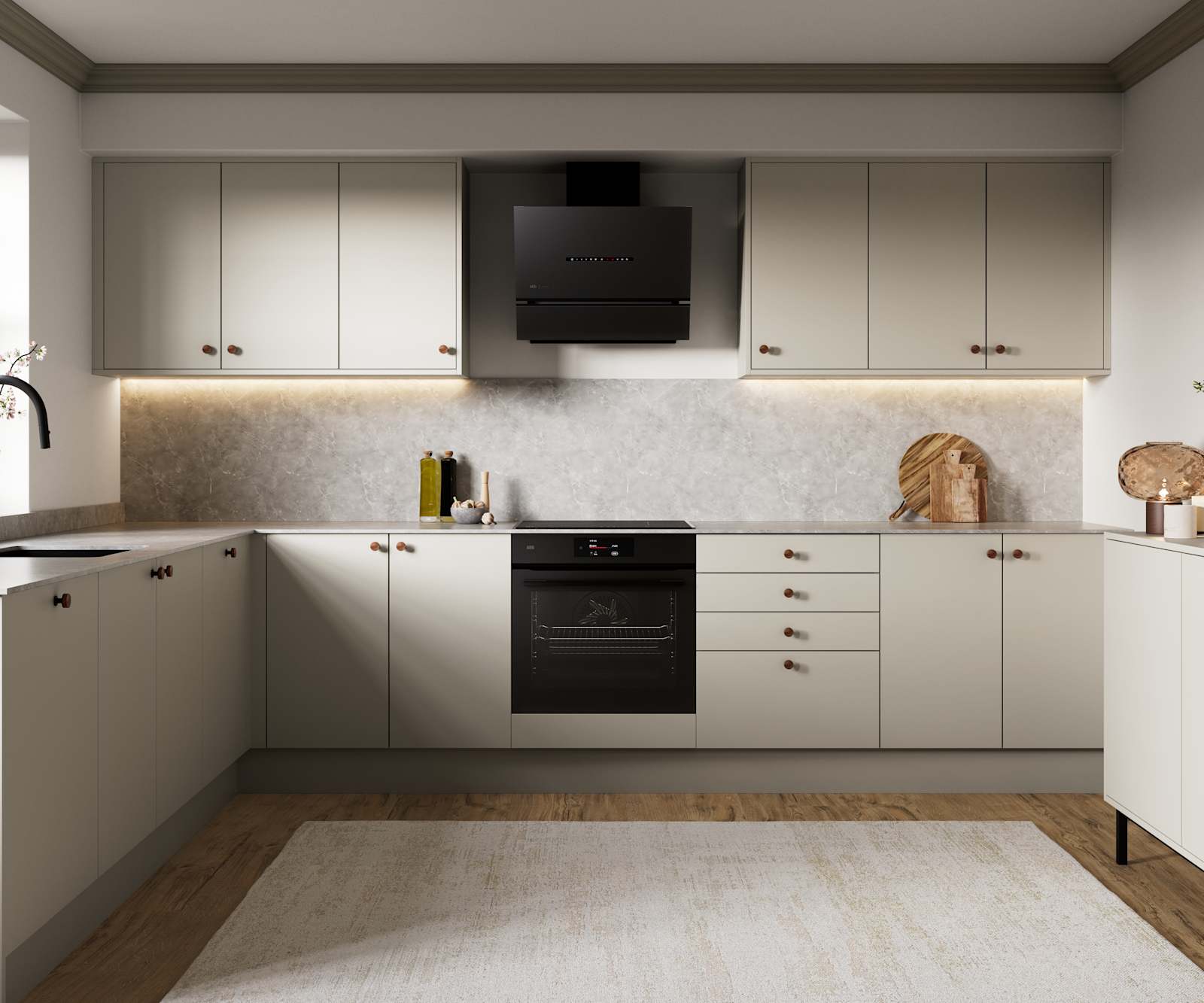 Modern slab kitchen Ascoli in neutral shade Limestone with brass knobs and black tap