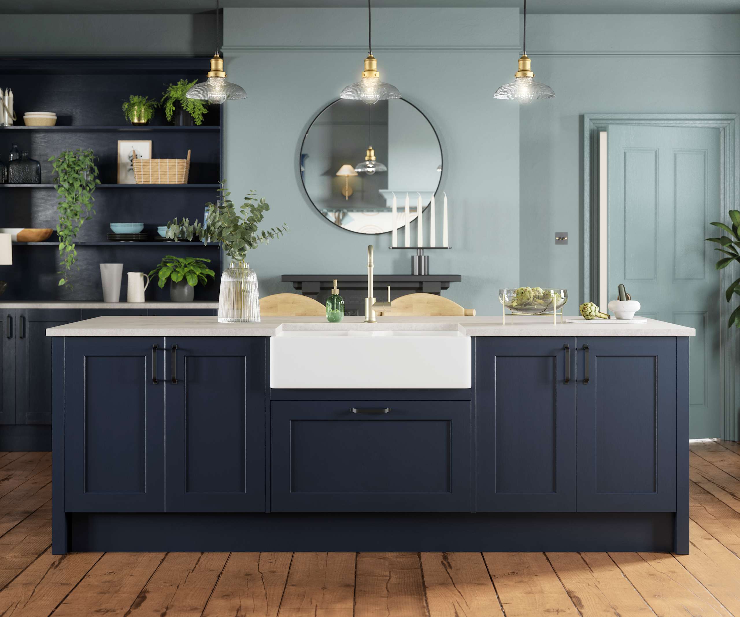 Modern country-style kitchen island with Shaker door Ludlow in dark blue shade Midnight, a porcelain sink, marbled worktop, brass tap and open shelves in matching blue.