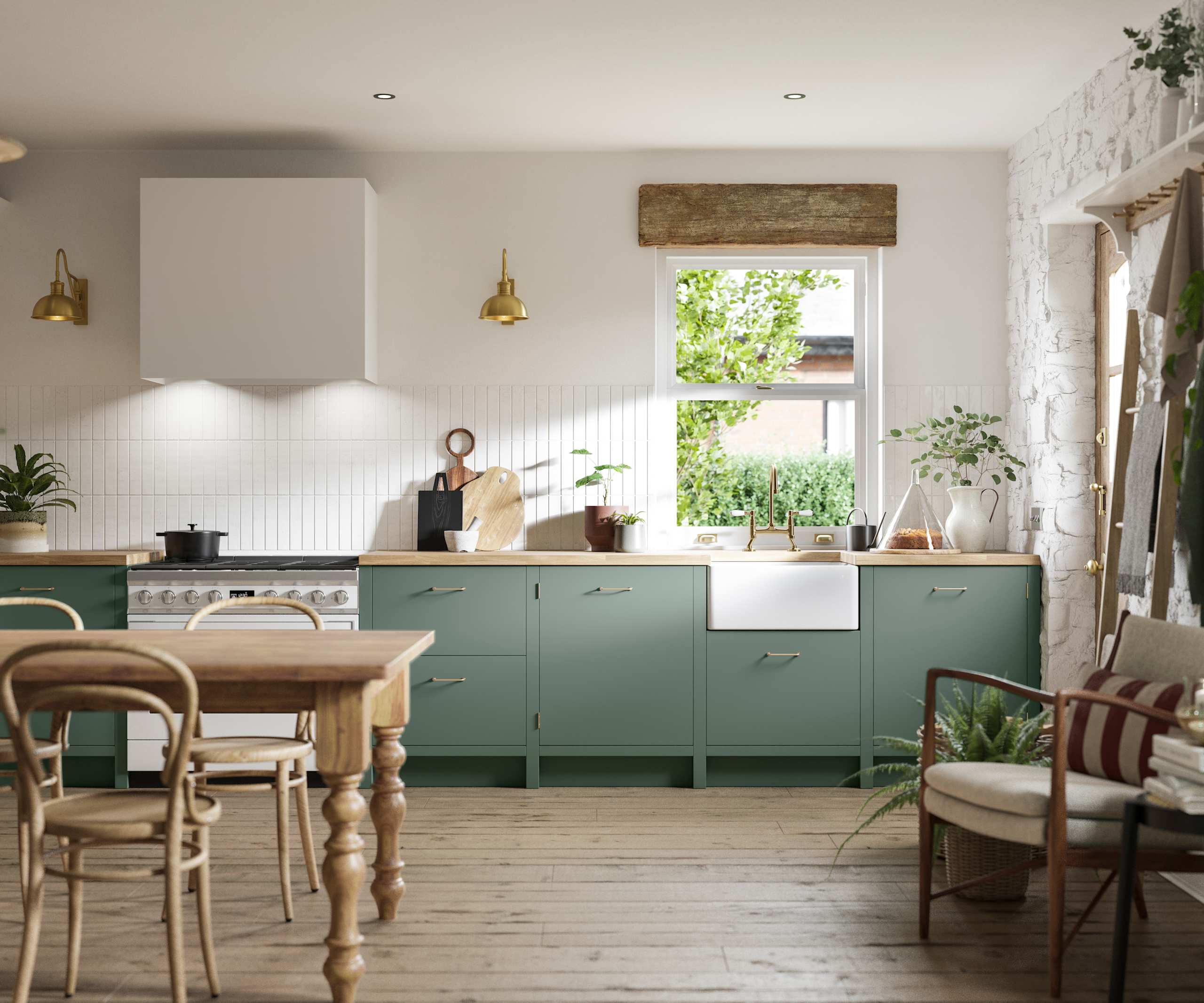 Soho Eucalyptus green open plan kitchen in contemporary cottage with a light wood dining table.