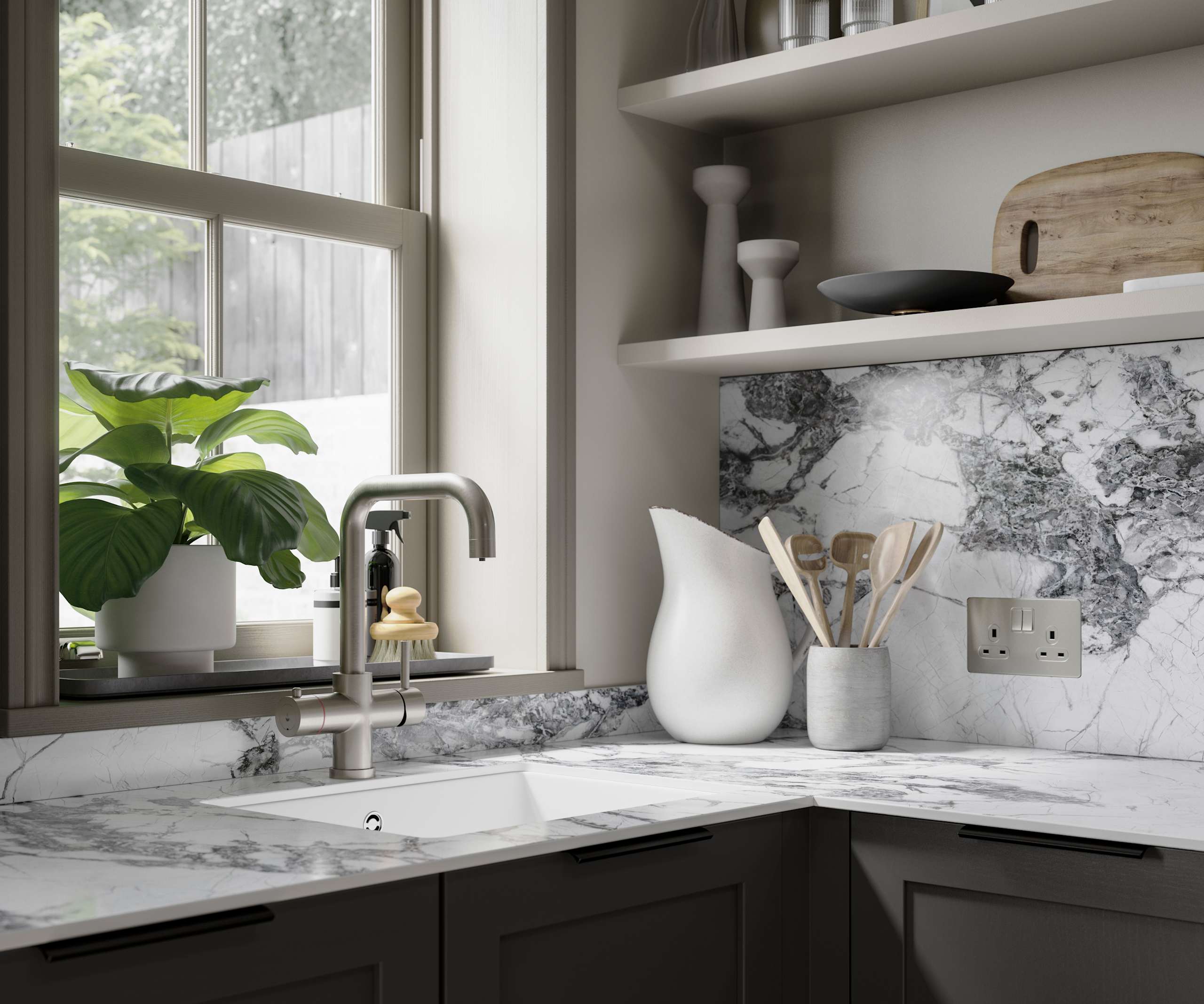 Close-up of marble worktop and backsplash in dark grey shaker kitchen.