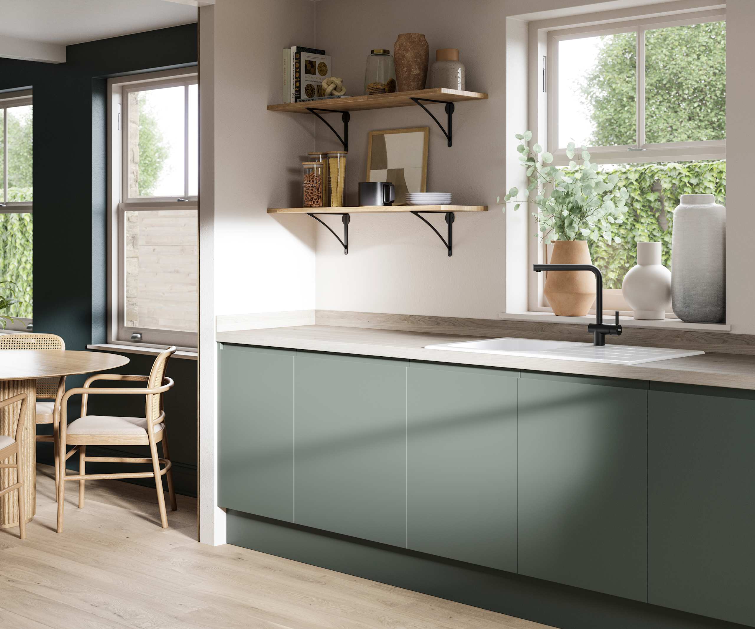 Minimalist kitchen design Luna in a green shade. Its integrated handle gives any kitchen a beautiful, sleek finish.