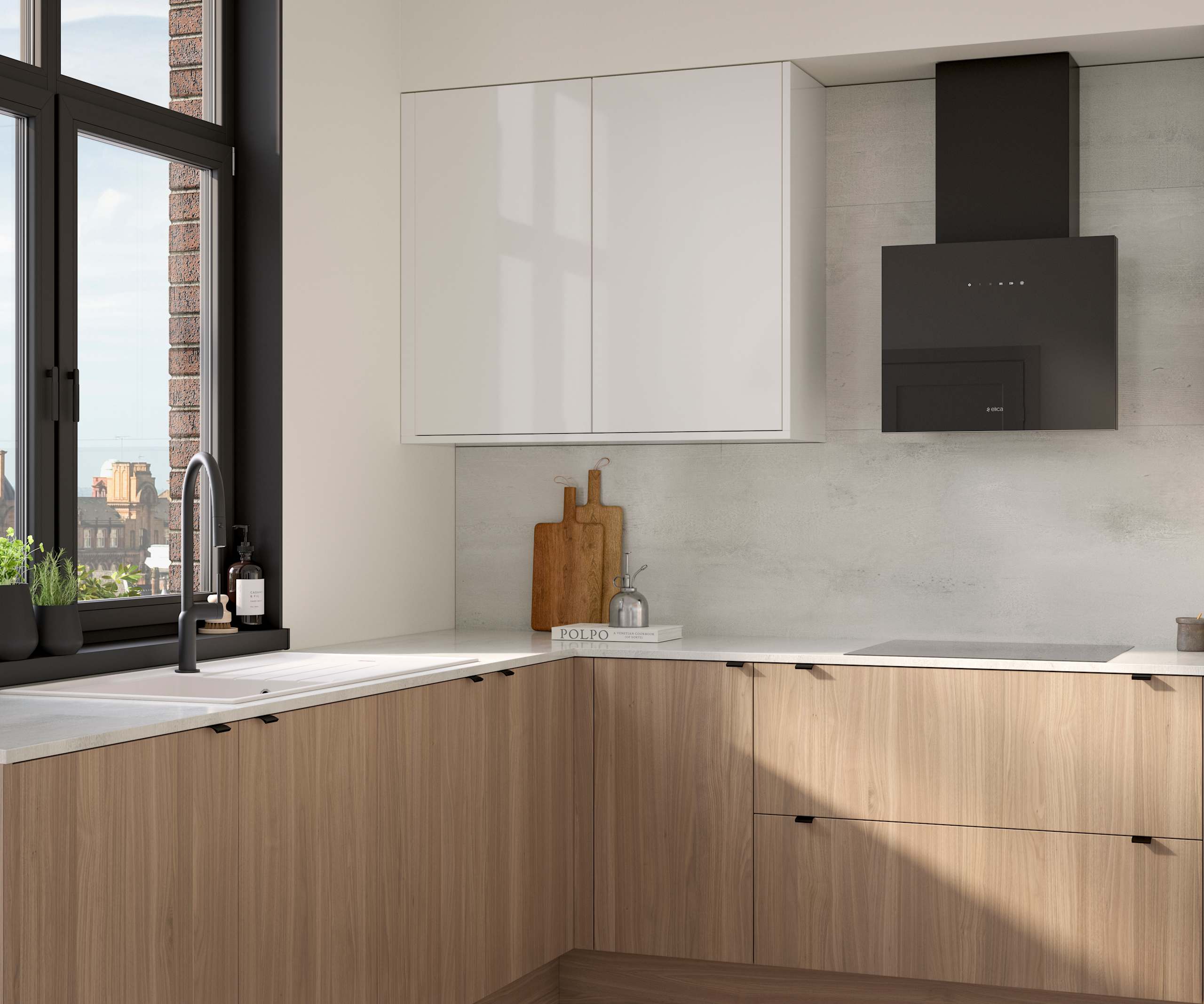 Ascoli kitchen from Magnet with Natural Oak cabinetry, a white worktop, Ascoli Gloss white wall cabinets over countertop paired with matching black handles, tap, hood and window frame over white sink.