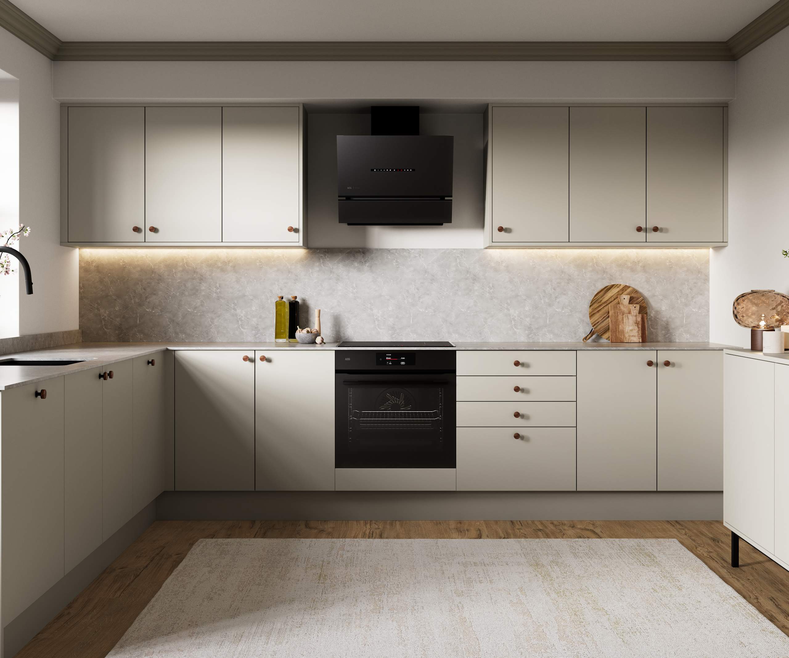 Modern slab kitchen Ascoli in neutral shade Limestone with brass knobs and black tap