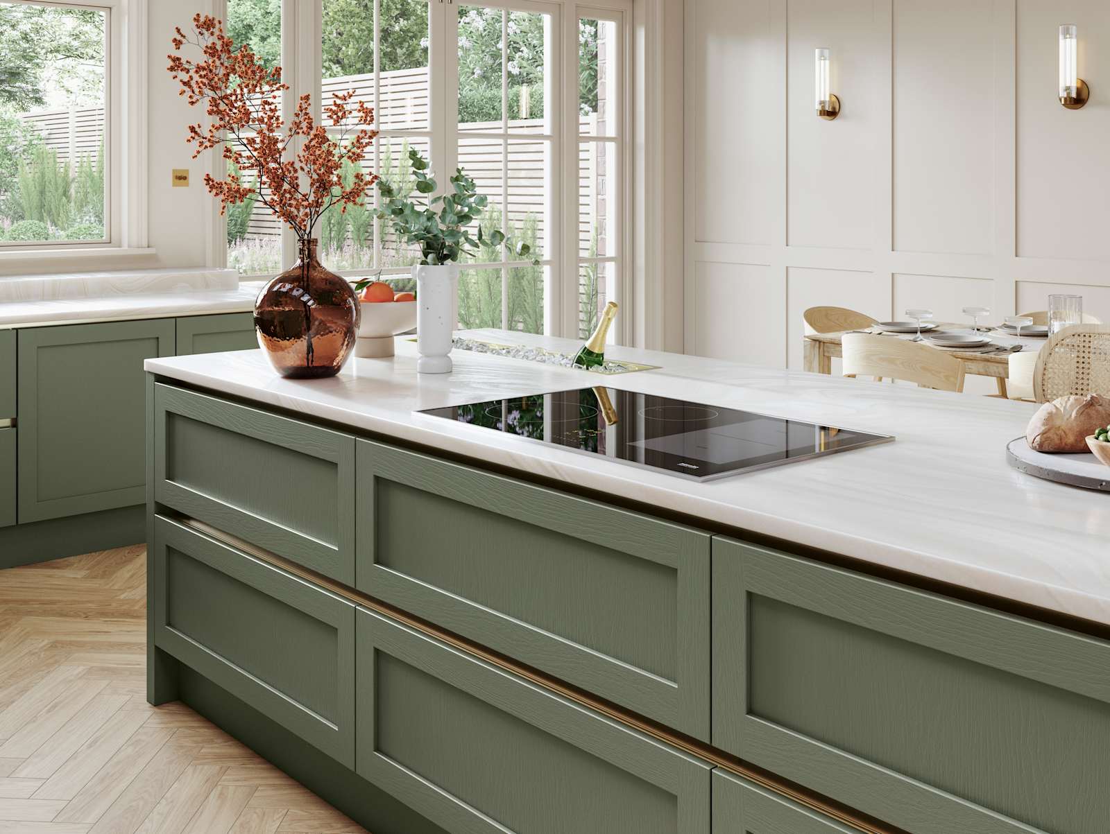 Kitchen island in Integra Wardley shade Misty Moor with narrow framing and integrated handles, on a painted timber finish.