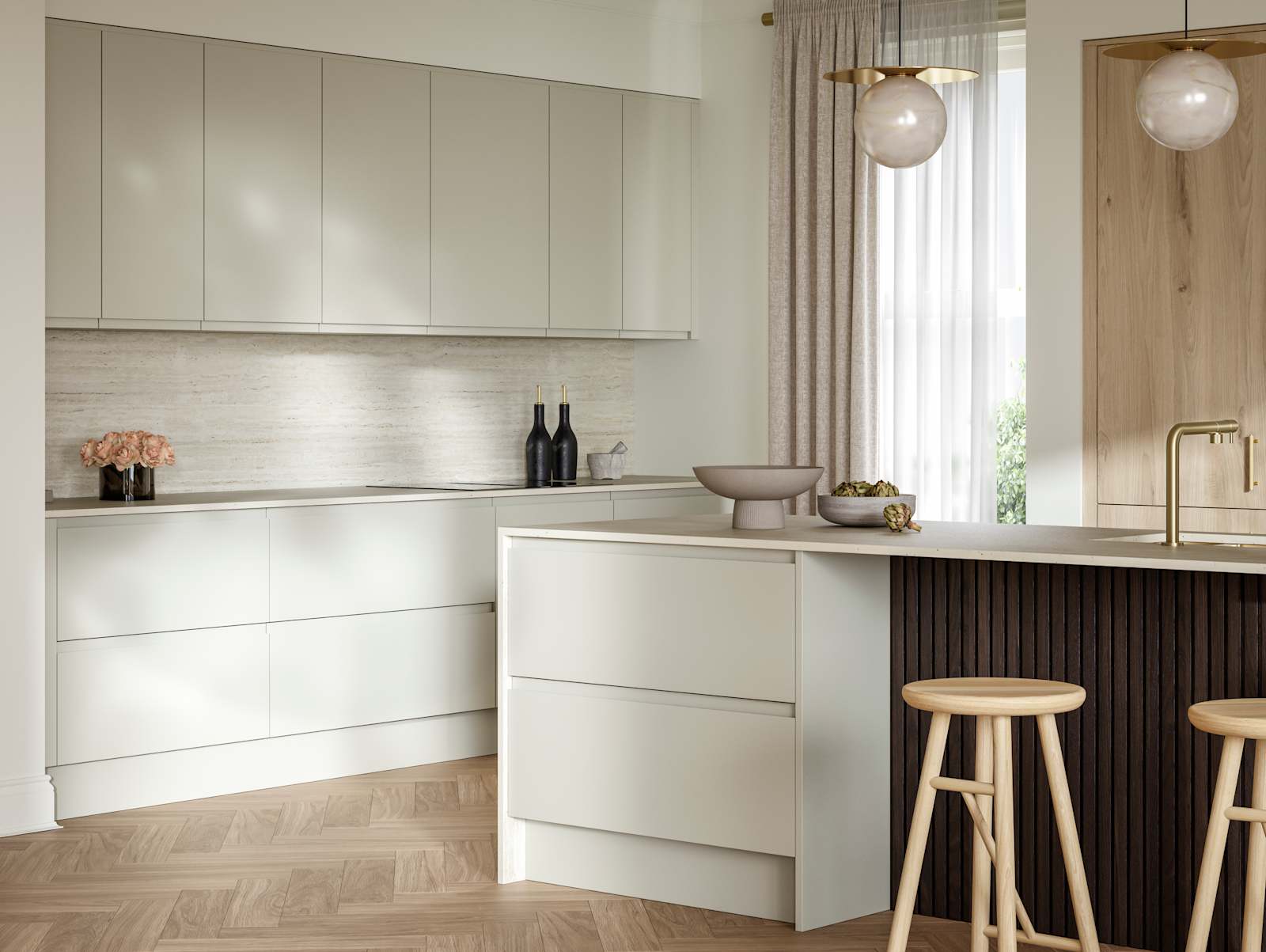 A bright and airy open-plan kitchen that incorporates Duxbury drawers and cabinets in Limestone, and Portobello units in Bosco. Combined with dark wood paneling on kitchen island bar.