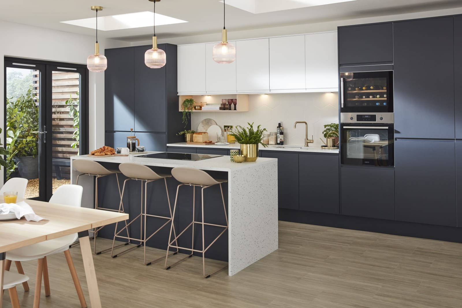 open plan kitchen brick wall