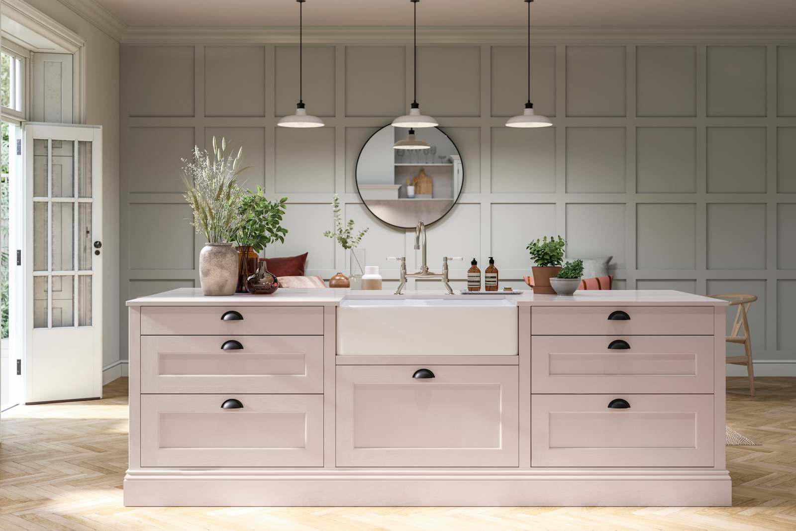 Ludlow kitchen. Our latest Shaker door, with a modern country-style. Here in the light pink shade Rose bowl, paired with plants in earth tone planters.