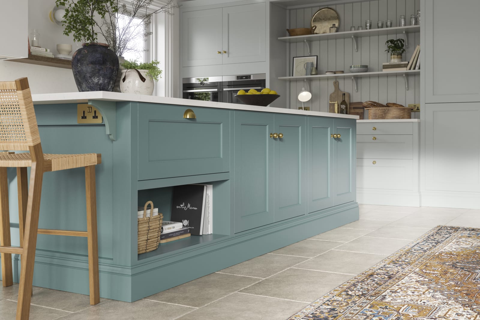 A stylish blue kitchen with contemporary Shaker panelling.