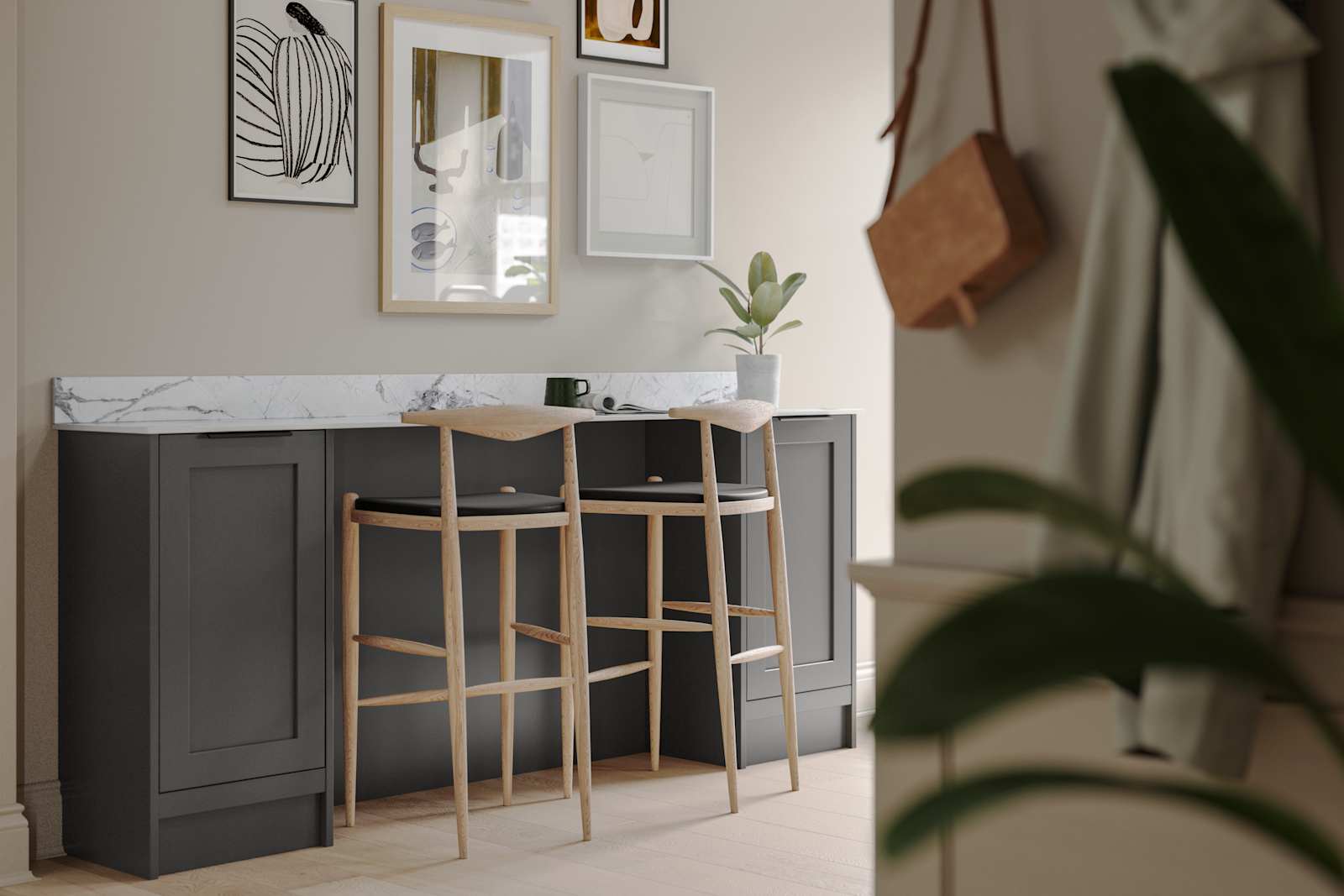 A dark grey Shaker bar sideboard with Charcoals cabinetry, paired with marble splashback and wooden high chairs.