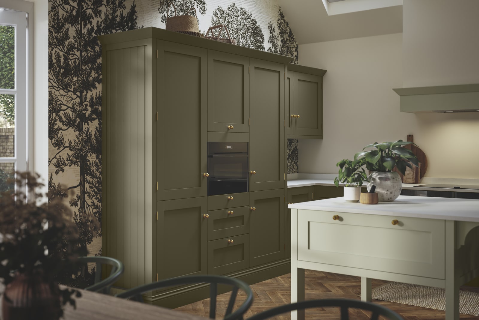 Tall Wardley Arboretum kitchen cabinets and a lighter kitchen island, all with brass details.