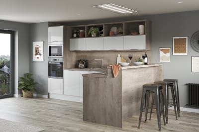 Nova by Magnet. Affordable slab door kitchen available in matt and super glass. 6 colours to choose from.