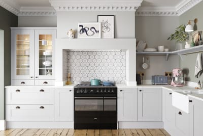 Winchester Dove grey, the wood grain effect affordable traditional kitchen by Magnet, with display cabinets.