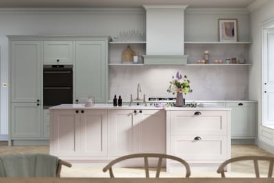 Ludlow, a traditional Shaker-style kitchen range featuring panelled doors with visible woodgrain and beading detail, in the light airy shade Seagrass.