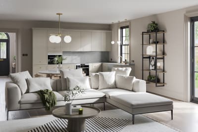 Open plan living room with Dunham kitchen in a creamy light shade.