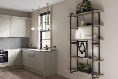 Dunham Pebble path kitchen combined with open wooden wall shelves on black matt metal frame.