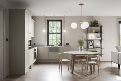 Light and nature tones open plan Dunham Pebble Path kitchen with dining table in light wood.