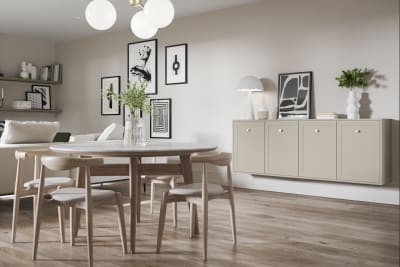 Living room decorated in light earth tones and wall hanging cabinetry in Dunham from Magnet, with a thin frame and smooth painted finish with no visible woodgrain.