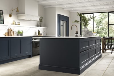 Open plan Integra Ludlow kitchen with kitchen island in dark blue shade Midnight.