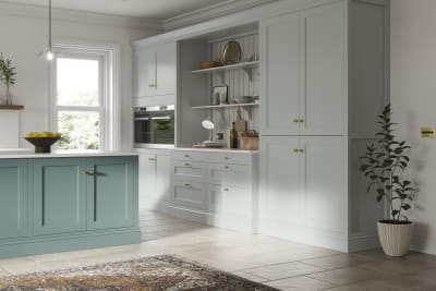 Traditional Shaker-style kitchen range featuring panelled doors with visible woodgrain and beading detail