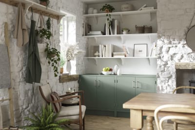 Living room in a charming contemporary cottage with Soho cabinetry in shade Eucalyptus green, a modern slab door with a painted rather than foil surface, for a truly premium look.