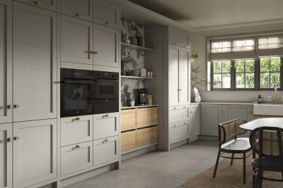 A neutral Shaker kitchen with Pebble and Nordic Craft cabinetry, with belfast sink.