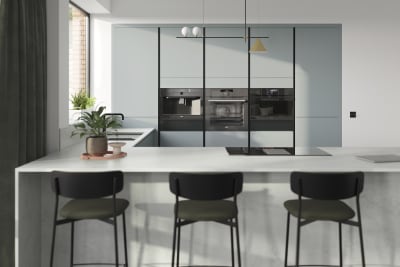 Integra Sky is a light blue frameless slab door with integrated handles in a smooth paint finish.