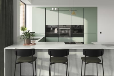 Integra Soho Eucalyptus green is a frameless slab door with integrated handles in a smooth paint finish.