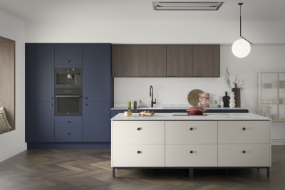 Soho Midnight kitchen with fluted wood Nordic Nature wall cabinets and Soho Dove grey kitchen island, a premium painted slab front.