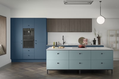 Soho Voyage Blue kitchen with fluted wood Nordic Nature wall cabinets and Soho Sky kitchen island, a premium painted slab front.