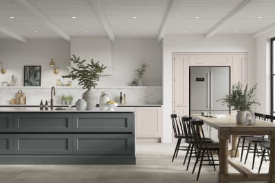 Integra Ludlow in shades Lilac Blossom and Arboretum Green, a contemporary take on a Shaker kitchen, where the premium frontal features panelled doors with integrated handles.