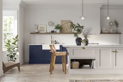 Traditional Shaker-style kitchen range in dark shade Midnight blue with a lighter Dove grey shade kitchen island.