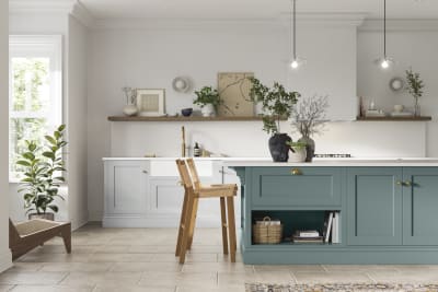 Traditional Shaker-style kitchen range featuring panelled doors with visible woodgrain and beading detail.