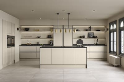 Open plan Integra Hoxton Pebble path kitchen with kitchen island, with black accent details and black worktop, tap and whitegoods.