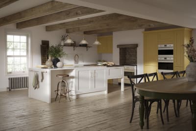 Alt text: Open floorplan shaker kitchen in the bright and beautiful yellow shade Harvest, paired with a kitchen island with matching frame door cabinets in the shade Limestone.